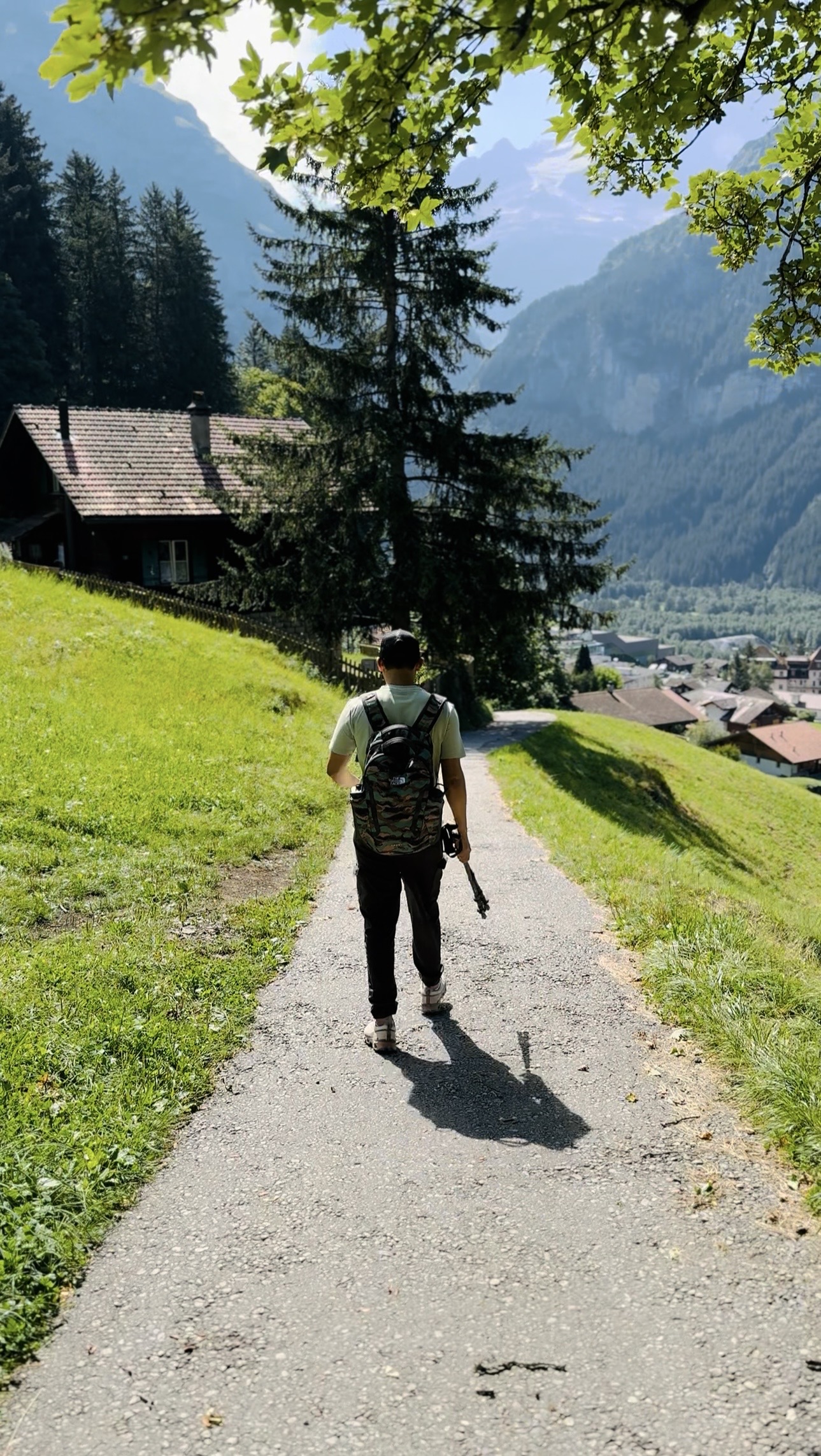Looking down over Grindelwald village and its chalets from the trail above town