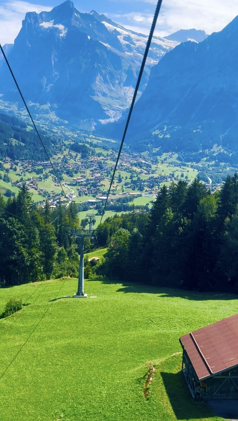 Riding the Männlichen gondola above Grindelwald, the scenic start of the Wengen to Lauterbrunnen hike day